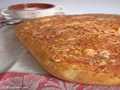 Πατάτα focaccia με τυρί και ψητό σκόρδο