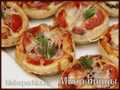 Mini pizzas con salchichas ahumadas