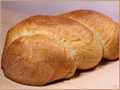 Sieve twisted bread from flour 1 grade in the oven