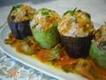 Stuffed zucchini and eggplant on a vegetable cushion