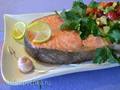 Steamed salmon with avocado and strawberry salad