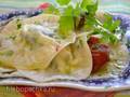 Ravioli met cottage cheese, dor blauwe kaas, spinazie, met geurige boter met zongedroogde tomaten