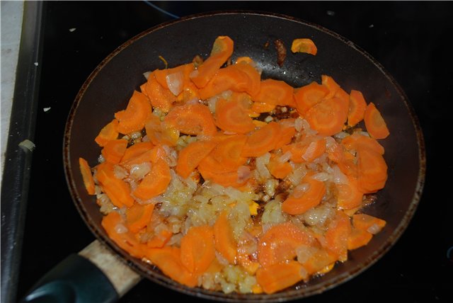 Solyanka (stewed cabbage) with sausages