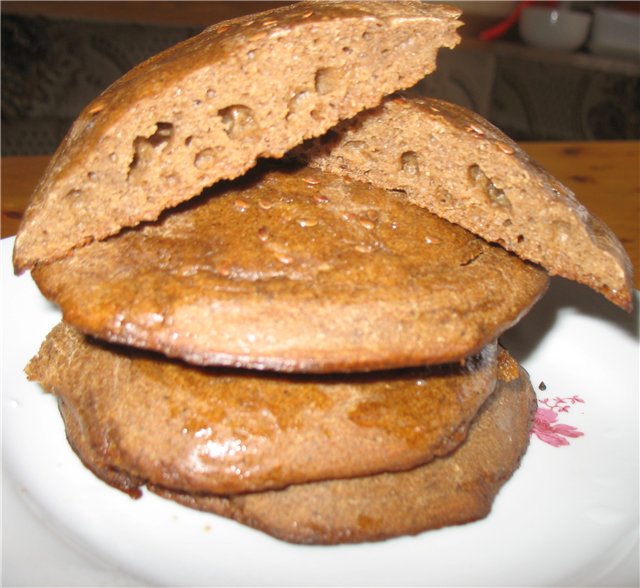 Kolobok (gingerbread man) in the oven