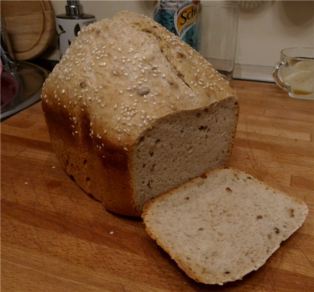 Sourdough na tinapay na gawa sa 1 grade harina (sa isang gumagawa ng tinapay)