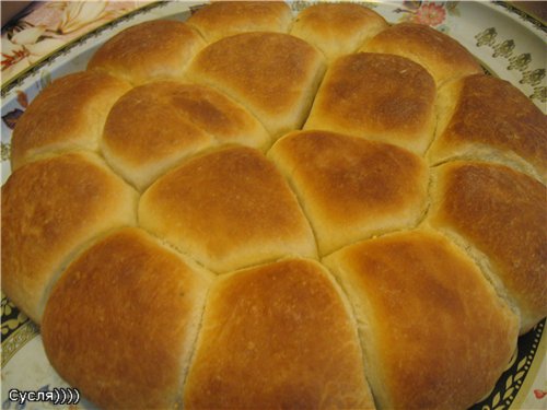 Bollos buhtle con mermelada y salsa de vainilla