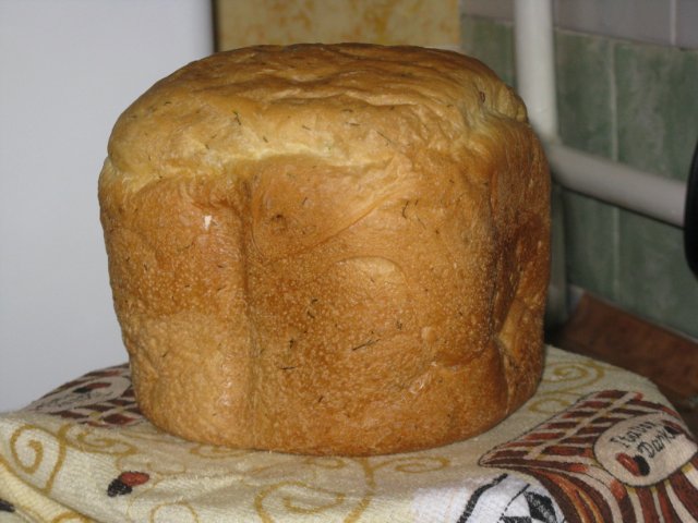 Spicy bread with garlic and herbs in a bread maker