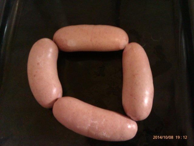 Wurstring im Ofen - sausage ring in German