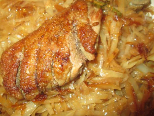 Duck breasts with Madeira sauce and spicy cabbage