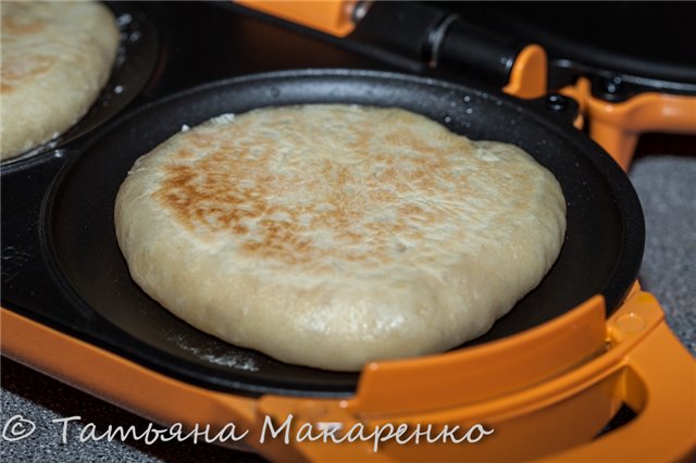 Italian donuts Tigelle (TIGELLE) (pancakes baked in a pan on dough with lard)