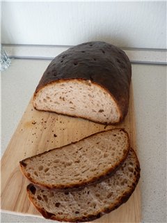 Lithuanian wheat-rye custard with caraway seeds (Sventine duona) in the oven