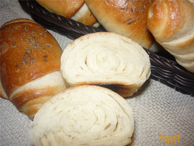 Arrows with caraway seeds on a thick dough