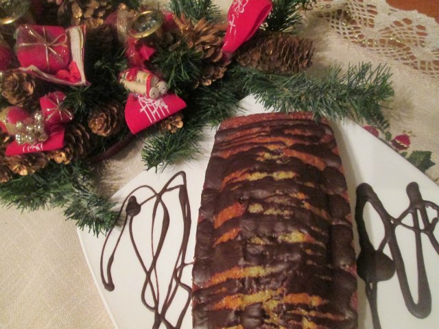 Orange muffin in chocolate-caramel glaze