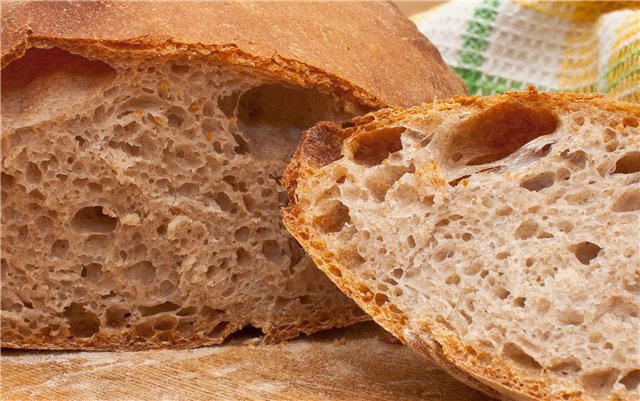 Rustic wheat bread (Pane Bigio) in the oven