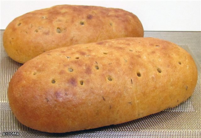 Lithuanian wheat-rye custard with caraway seeds (Sventine duona) in the oven