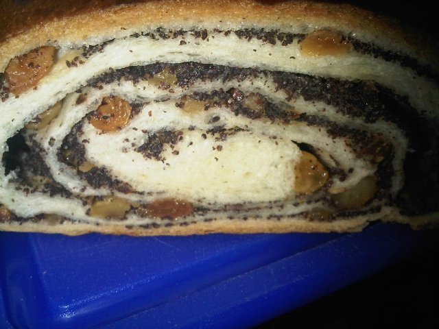 Roll with poppy seeds, nuts and raisins