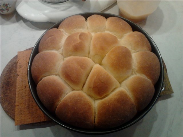 Bollos buhtle con mermelada y salsa de vainilla