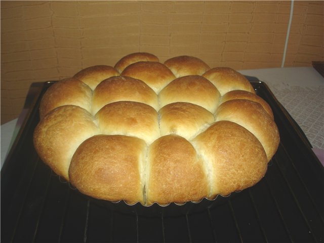 Bollos buhtle con mermelada y salsa de vainilla