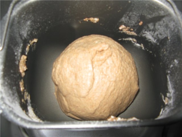 Tomato wheat-rye bread with onions, cheese and herbs (bread maker)