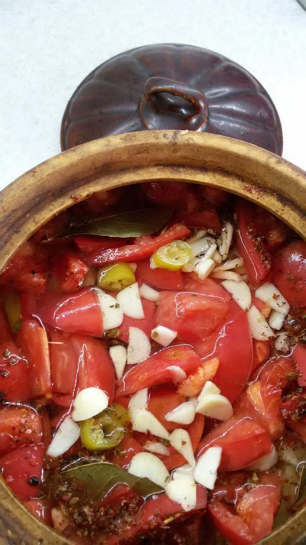 Pot of meat and vegetables with broth