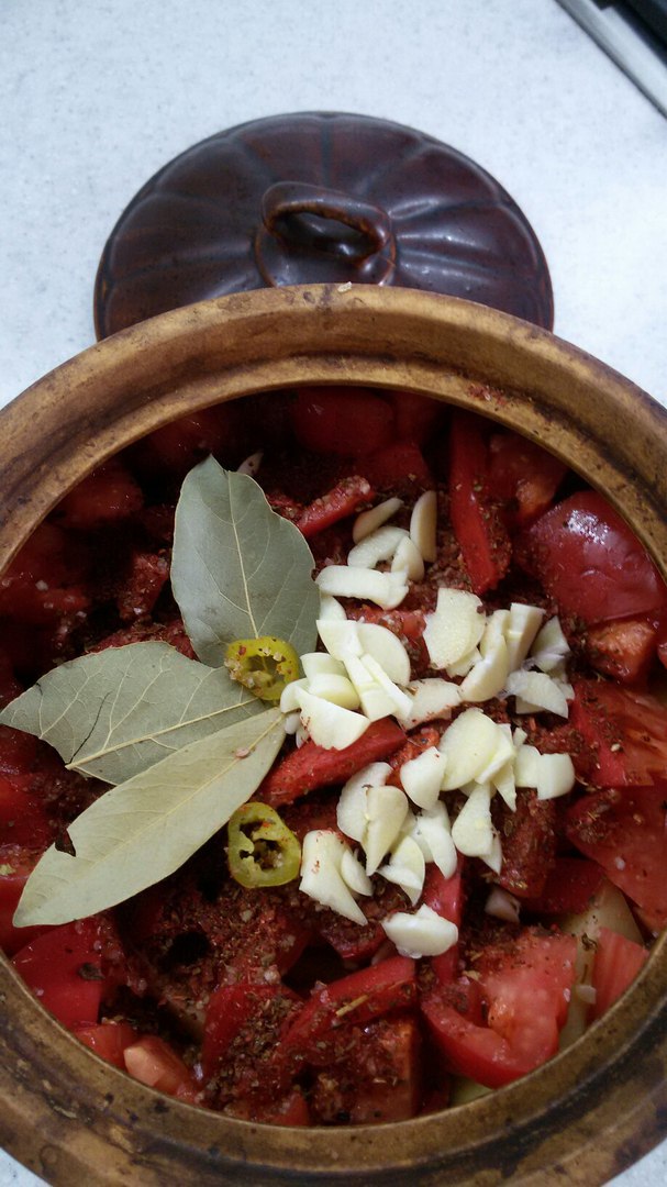 Pot of meat and vegetables with broth