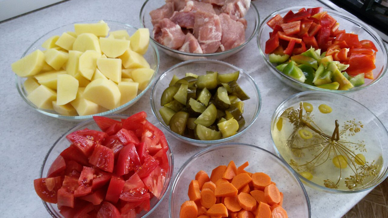 Pot of meat and vegetables with broth