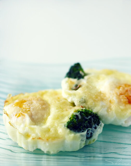 Baked eggs with broccoli and cheese