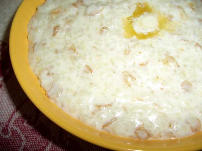 Porridge di latte "Riso con fiocchi di cereali"